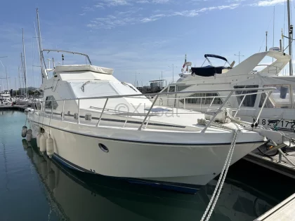 Barco a motor usado GUY COUACH 1202